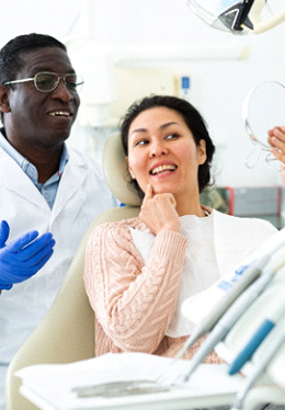 Woman smiling in the dental chair