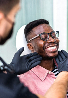 Man smiling in the dental chair