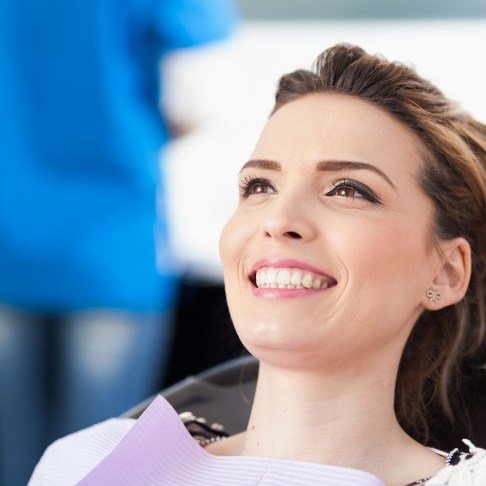 Woman smiling during preventive dentistry checkup and teeth cleaning