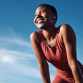 Lady smiles outdoors
